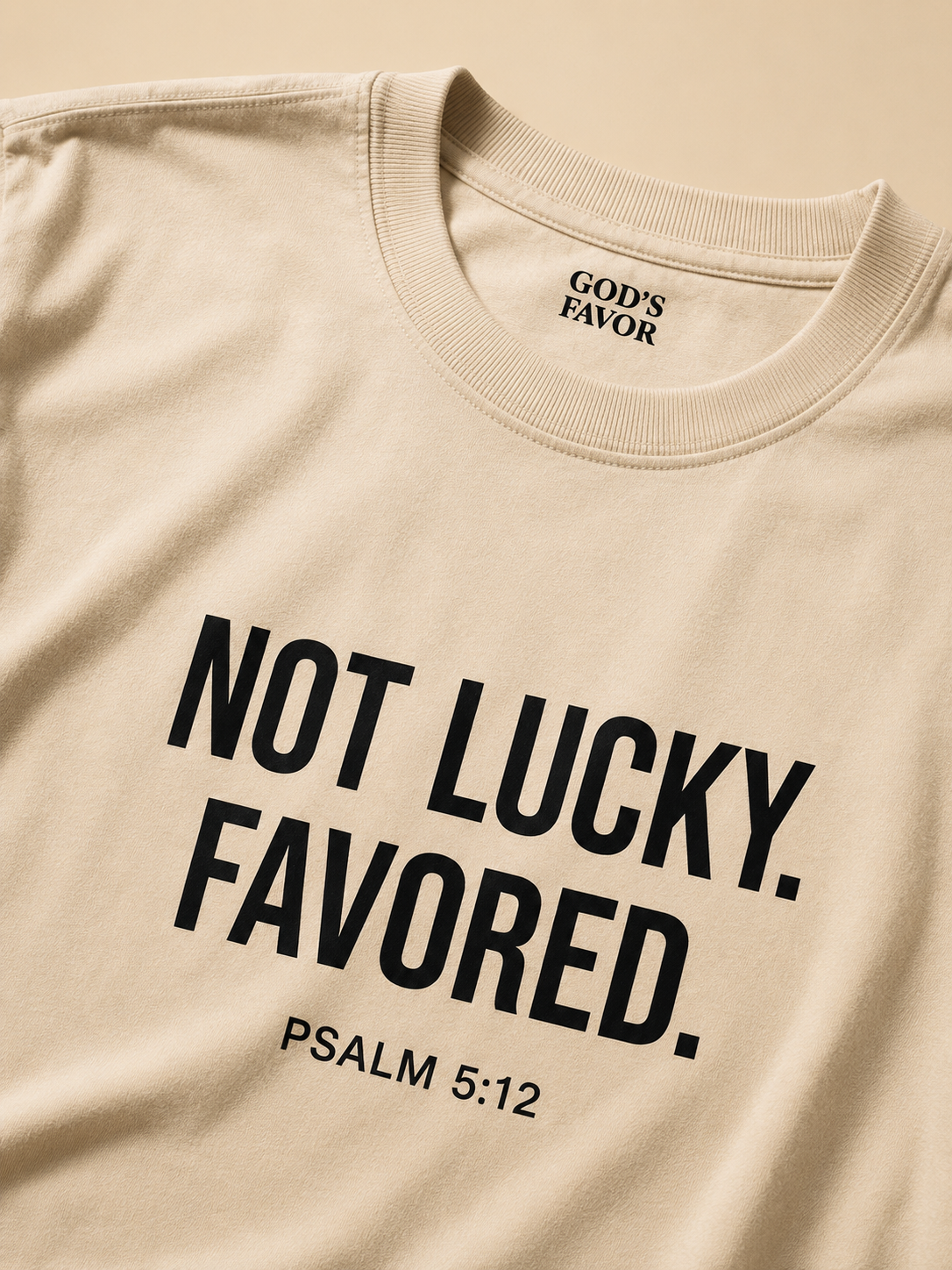 Not Lucky. Favored.™ Premium Tee – Cream Edition