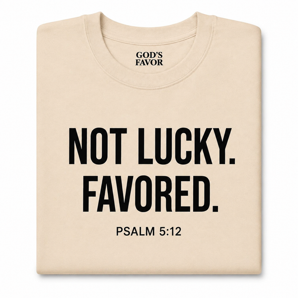 NOT LUCKY. FAVORED.™ Premium Tee